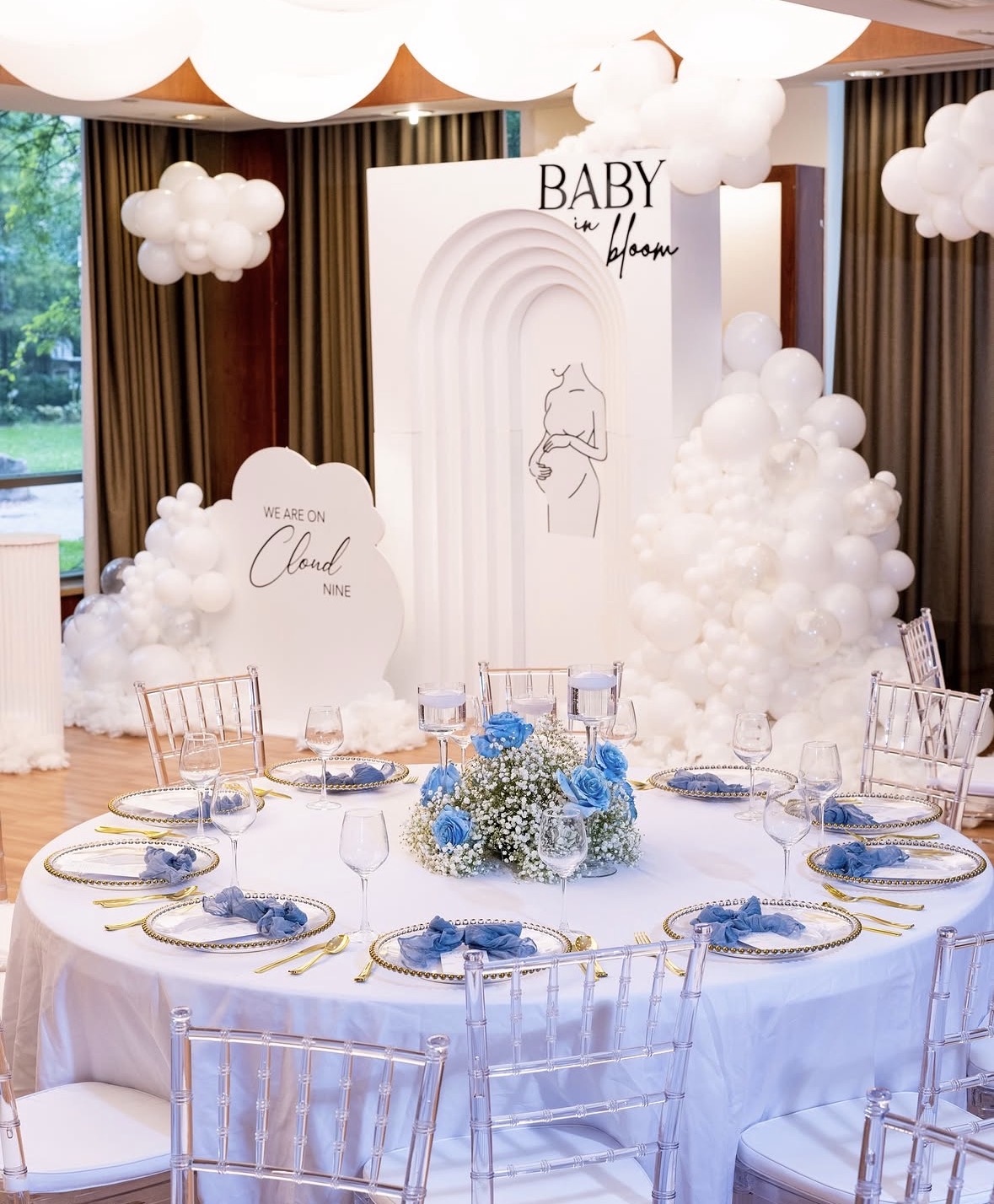 White and blue baby shower full room