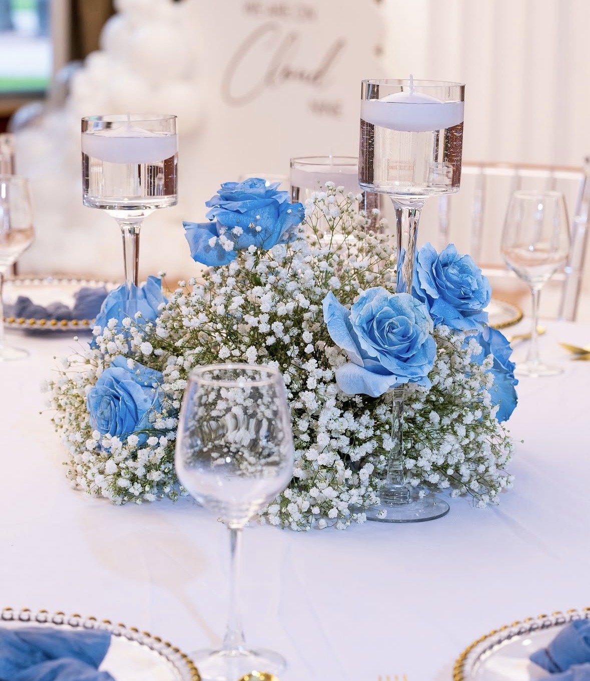 Blue rose and baby's breath centerpiece