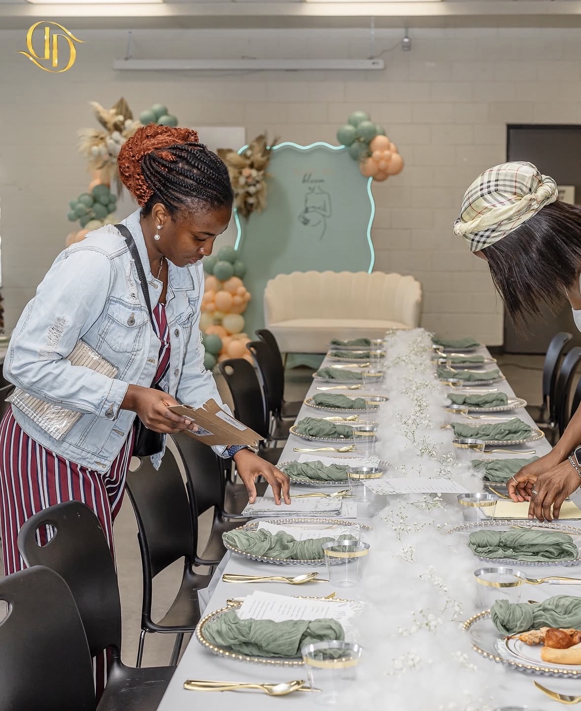 Sage green table setup with guests