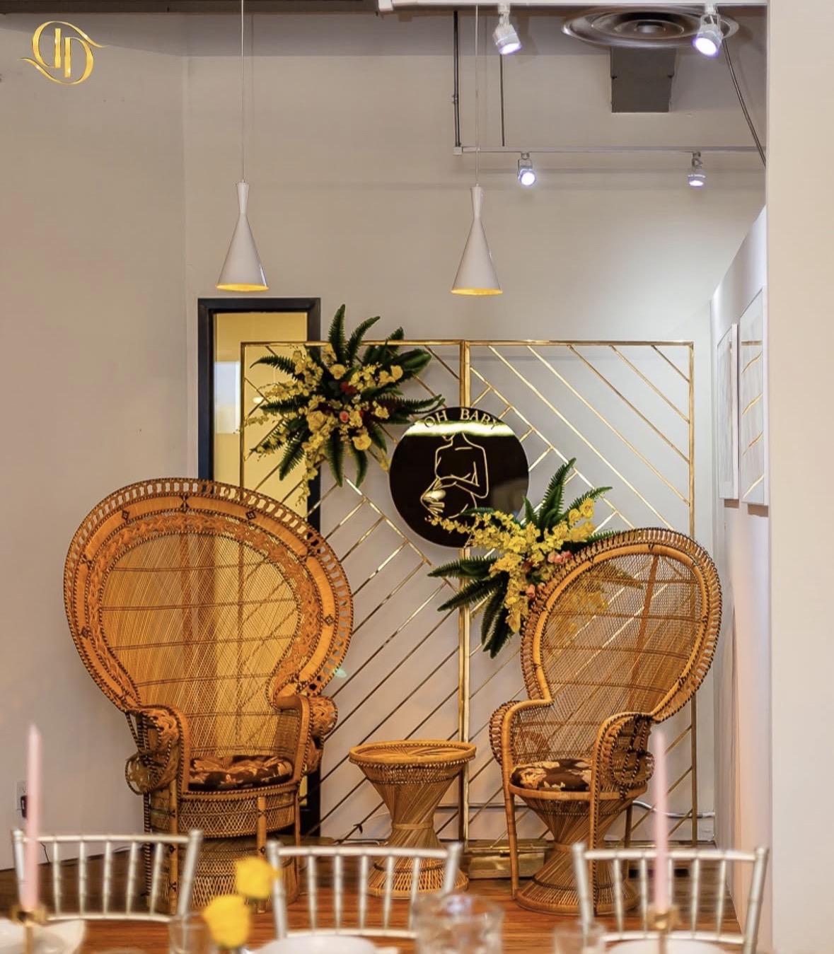 Gold peacock chairs baby shower setup